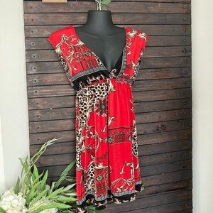 Oriental pattern dress with plunging neckline